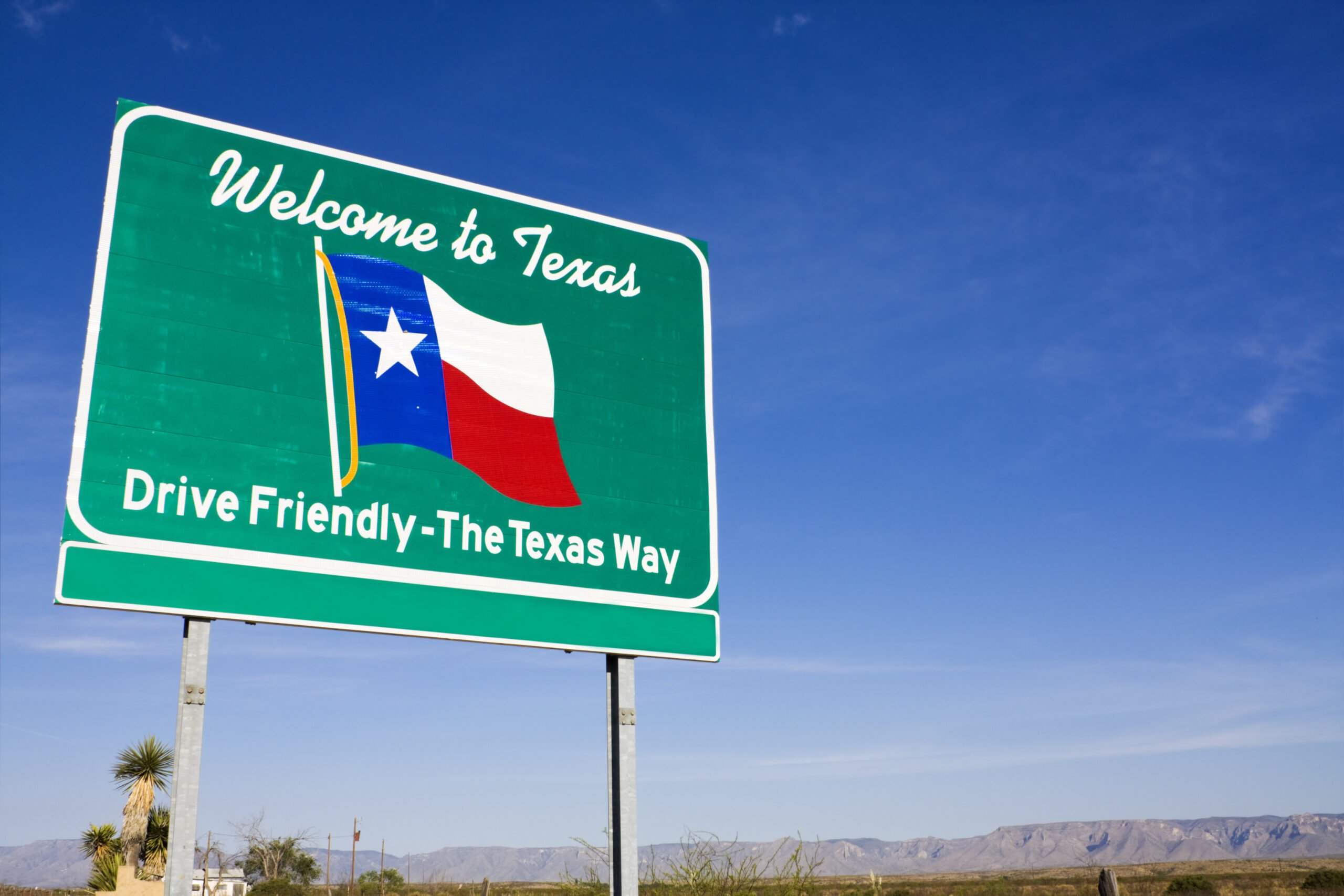 Welcome to Texas road sign alongside the highway